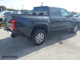 2024 Toyota Tacoma 4WD SR5 with VIN 3TMLB5JN5RM052698, listed as a IAAI auction lot 41427313 with 9,624 mi miles. Bid and sale history available at carsss.com. Image 4.