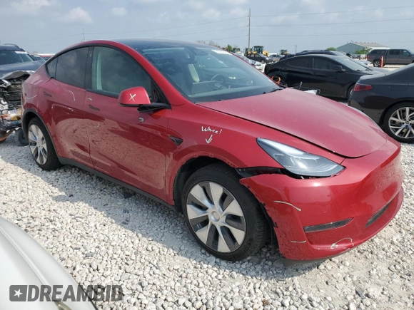 2021 Tesla Model Y Standard Range with VIN 5YJYGDED5MF116562, listed as a Copart auction lot 51211535 with 68,549 mi miles and Salvage Title. Bid and sale history available at DreamBid. Image 4.
