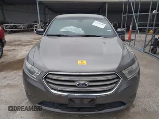 2015 Ford Taurus SEL z VIN 1FAHP2E85FG209085, wystawiony jako IAAI lot #41944532 z przebiegiem 143 850 mil mil oraz . Historia ofert i sprzedaży dostępna na DreamBid. Obrazek 12.