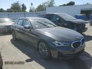 2023 BMW 5 Series 530e with VIN WBA13AG00PCL24045, listed as a Copart auction lot 84961634 with Not provided miles and Salvage title. Bid and sale history available at DreamBid. Image 4.