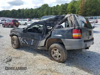 1996 Jeep Grand Cherokee Laredo with VIN 1J4FX58S6TC349590, listed as a Copart auction lot 72278714 with 0 mi miles and Salvage Title. Bid and sale history available at carsss.com. Image 2.