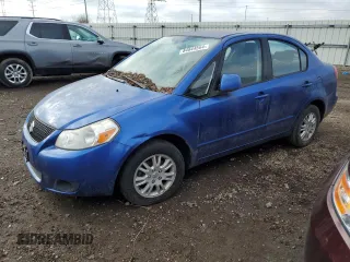 2012 Suzuki SX4 LE with VIN JS2YC5A35C6303573, listed as a Copart auction lot 84844564 with 0 mi miles and Clean Title. Bid and sale history available at carsss.com. Image 1.