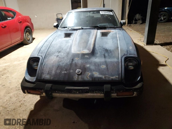 1979 Datsun 280ZX z VIN HGS130119790, wystawiony jako Copart lot #41504935 z przebiegiem 36 796 mil mil oraz Tytuł czysty. Historia ofert i sprzedaży dostępna na DreamBid. Obrazek 5.