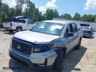 2021 Honda Ridgeline Sport with VIN 5FPYK3F10MB021413, listed as a IAAI auction lot 39847416 with 28,044 mi miles. Bid and sale history available at carsss.com. Image 2.
