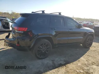 2018 Jeep Grand Cherokee Altitude with VIN 1C4RJFAGXJC296051, listed as a Copart auction lot 53450135 with 65,838 mi miles and Salvage title. Bid and sale history available at DreamBid. Image 3.