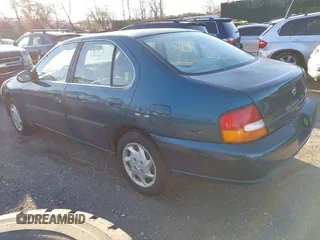 1998 Nissan Altima XE with VIN 1N4DL01D3WC253479, listed as a IAAI auction lot 41766827 with 145,441 mi miles. Bid and sale history available at carsss.com. Image 3.