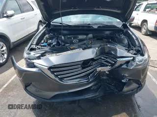 2019 Mazda CX-9 Touring with VIN JM3TCACY6K0334085, listed as a IAAI auction lot 42391595 with 113,723 mi miles and . Bid and sale history available at DreamBid. Image 10.