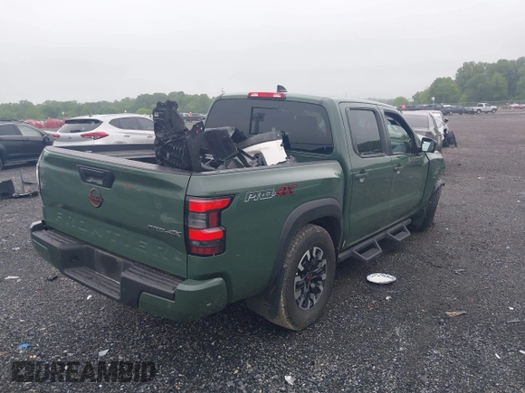 2023 Nissan Frontier Pro-4X z VIN 1N6ED1EK9PN620138, wystawiony jako IAAI lot #42186261 z przebiegiem 30 008 mil mil oraz . Historia ofert i sprzedaży dostępna na DreamBid. Obrazek 4.