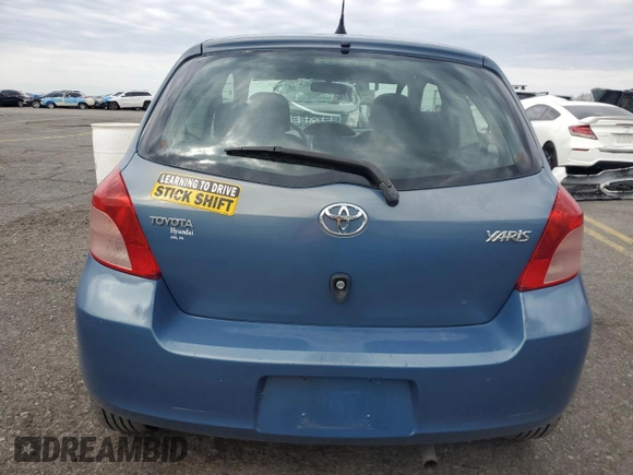 2007 Toyota Yaris with VIN JTDJT923475083016, listed as a Copart auction lot 52903115 with 127,280 mi miles and Salvage Title. Bid and sale history available at carsss.com. Image 6.