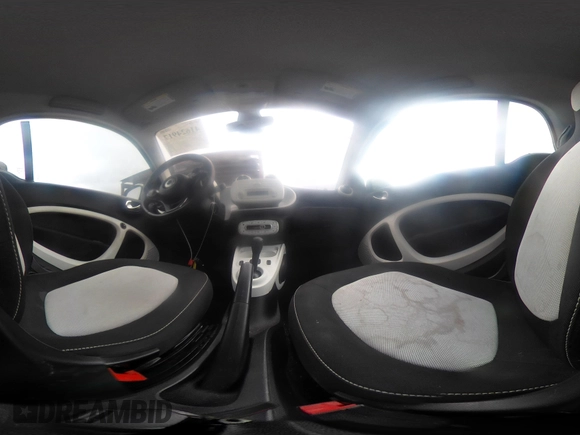 2016 Smart fortwo Passion z VIN WMEFJ5DA8GK059871, wystawiony jako IAAI lot #41624917 z przebiegiem 90 906 mil mil oraz . Historia ofert i sprzedaży dostępna na DreamBid. Obrazek 18.