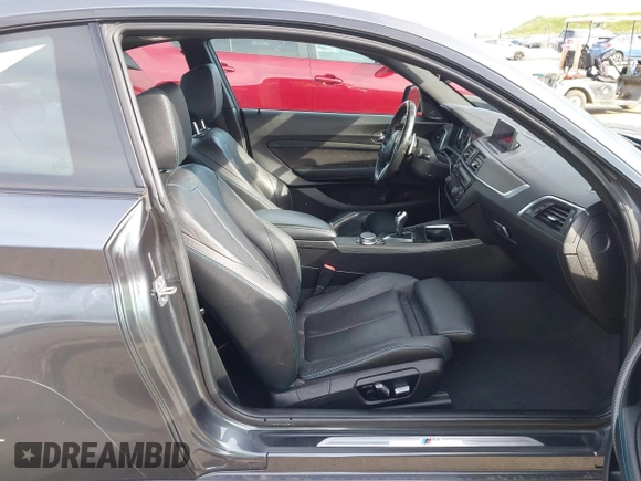 2018 BMW M2 with VIN WBS1J5C50JVE51869, listed as a IAAI auction lot 41814404 with 69,684 mi miles. Bid and sale history available at carsss.com. Image 5.