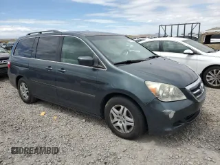 2006 Honda Odyssey EX-L z VIN 5FNRL38786B014188, wystawiony jako Copart lot #57140935 z przebiegiem Nie podano mil oraz Szkoda całkowita • Salvage title. Historia ofert i sprzedaży dostępna na DreamBid. Obrazek 4.