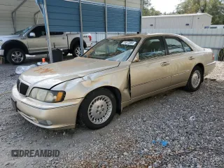 2000 Infiniti Q45 z VIN JNKBY31A0YM301297, wystawiony jako Copart lot #74672884 z przebiegiem 171 263 mil mil oraz Szkody całkowita. Historia ofert i sprzedaży dostępna na DreamBid. Obrazek 1.