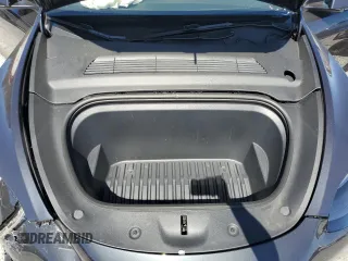 2025 Tesla Model Y Long Range with VIN 7SAYGAEEXSF253326, listed as a Copart auction lot 49527965 with 5,803 mi miles and Salvage Title. Bid and sale history available at DreamBid. Image 14.