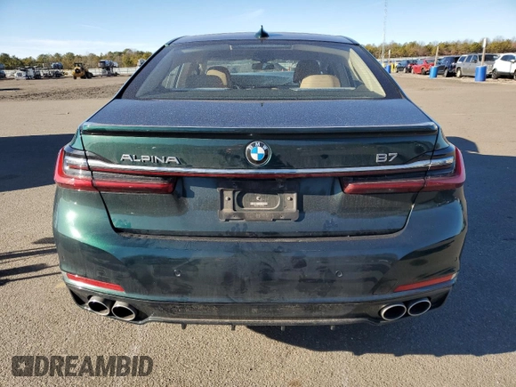 2022 BMW 7 Series with VIN WBA7U2C11NCJ22940, listed as a Copart auction lot 87848125 with 37,023 mi miles and Salvage title. Bid and sale history available at DreamBid. Image 6.