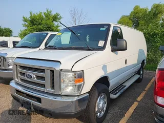 2014 Ford Econoline Cargo Commercial z VIN 1FTNE2EW0EDA95532, wystawiony jako IAAI lot #42442160 z przebiegiem 140 667 mil mil oraz . Historia ofert i sprzedaży dostępna na DreamBid. Obrazek 16.