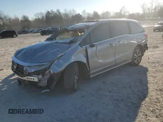 2022 Honda Odyssey Touring z VIN 5FNRL6H89NB048701, wystawiony jako Copart lot #45966515 z przebiegiem Nie podano mil oraz Szkoda całkowita • Salvage title. Historia ofert i sprzedaży dostępna na DreamBid. Obrazek 1.