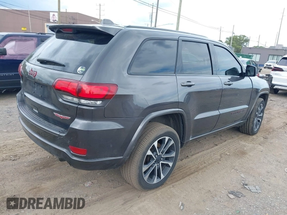 2021 Jeep Grand Cherokee 80th Anniversary with VIN 1C4RJFBG8MC728364, listed as a IAAI auction lot 39803814 with 34,000 mi miles and . Bid and sale history available at DreamBid. Image 4.