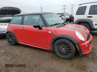 2005 MINI Hardtop S with VIN WMWRE33525TD99548, listed as a Copart auction lot 54778205 with 187,150 mi miles and Salvage title. Bid and sale history available at DreamBid. Image 4.
