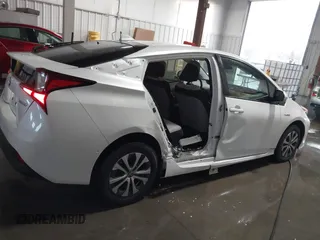 2021 Toyota Prius LE with VIN JTDL9MFU9M3025214, listed as a IAAI auction lot 41375860 with 76,259 mi miles and . Bid and sale history available at DreamBid. Image 14.