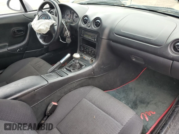 1999 Mazda MX-5 Miata with VIN JM1NB3531X0102616, listed as a Copart auction lot 59779415 with 194,494 mi miles and Salvage title. Bid and sale history available at DreamBid. Image 8.
