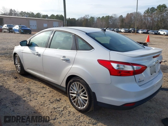 2013 Ford Focus Titanium with VIN 1FADP3J22DL167324, listed as a IAAI auction lot 41616927 with 127,259 mi miles and . Bid and sale history available at carsss.com. Image 3.