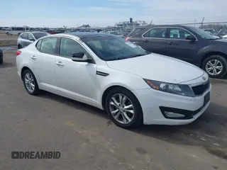 2013 Kia Optima EX with VIN 5XXGN4A7XDG111601, listed as a IAAI auction lot 41810208 with 192,767 mi miles. Bid and sale history available at carsss.com. Image 1.