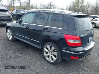 2010 Mercedes-Benz GLK with VIN WDCGG8HB0AF310995, listed as a IAAI auction lot 42023088 with 151,593 mi miles. Bid and sale history available at carsss.com. Image 1.