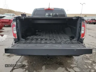 2018 GMC Canyon z VIN 1GTP6CE1XJ1173875, wystawiony jako Copart lot #47258005 z przebiegiem 104 076 mil mil oraz Szkoda całkowita • Salvage title. Historia ofert i sprzedaży dostępna na DreamBid. Obrazek 6.