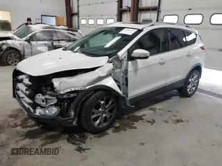 2014 Ford Escape Titanium with VIN 1FMCU9J91EUD43432, listed as a IAAI auction lot 40989177 with 110,383 mi miles and . Bid and sale history available at DreamBid. Image 17.