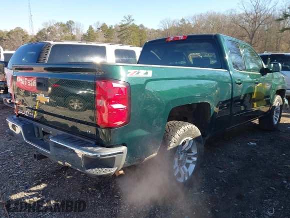 2015 Chevrolet Silverado 1500 LT with VIN 1GCRCREHXFZ267054, listed as a IAAI auction lot 41543297 with 134,087 mi miles. Bid and sale history available at carsss.com. Image 4.