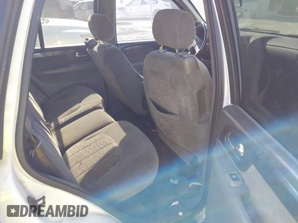 2003 GMC Envoy SLT with VIN 1GKDS13S832300090, listed as a IAAI auction lot 41993627 with 210,631 mi miles. Bid and sale history available at carsss.com. Image 8.