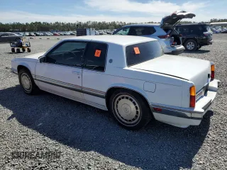 1990 Cadillac Eldorado z VIN 1G6EL1334LU616468, wystawiony jako Copart lot #76398934 z przebiegiem Nie podano mil oraz Szkody całkowita. Historia ofert i sprzedaży dostępna na DreamBid. Obrazek 2.
