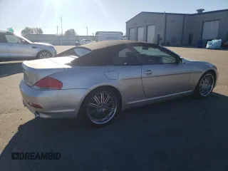 2004 BMW 6 Series 645Ci with VIN WBAEK73464B320194, listed as a Copart auction lot 76697644 with 110,823 mi miles and Salvage Title. Bid and sale history available at carsss.com. Image 3.