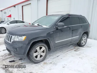 2011 Jeep Grand Cherokee 70th Anniversary with VIN 1J4RR4GG4BC519507, listed as a IAAI auction lot 41537091 with 175,967 mi miles. Bid and sale history available at carsss.com. Image 17.