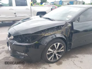 2017 Nissan Maxima Platinum z VIN 1N4AA6AP4HC403592, wystawiony jako IAAI lot #42177002 z przebiegiem 112 105 mil mil oraz . Historia ofert i sprzedaży dostępna na DreamBid. Obrazek 6.