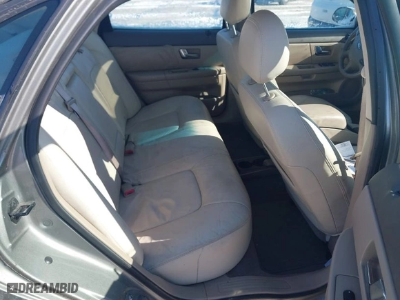 2002 Ford Taurus SEL with VIN 1FAHP56S82G144061, listed as a IAAI auction lot 41610496 with 100,106 mi miles. Bid and sale history available at carsss.com. Image 8.