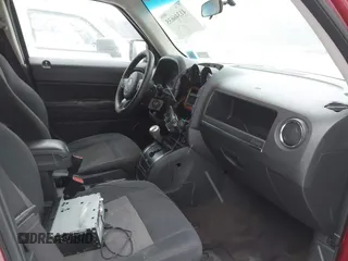 2015 Jeep Patriot Sport with VIN 1C4NJPBA4FD313006, listed as a IAAI auction lot 41536772 with 148,914 mi miles. Bid and sale history available at carsss.com. Image 5.