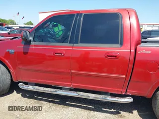 2002 Ford F-150 XLT with VIN 1FTRW07682KC33857, listed as a IAAI auction lot 41870137 with 185,480 mi miles. Bid and sale history available at carsss.com. Image 15.
