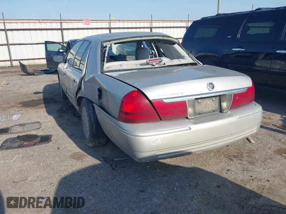 2004 Mercury Grand Marquis GS with VIN 2MEFM74W34X677247, listed as a IAAI auction lot 41856970 with 135,225 mi miles and . Bid and sale history available at DreamBid. Image 3.