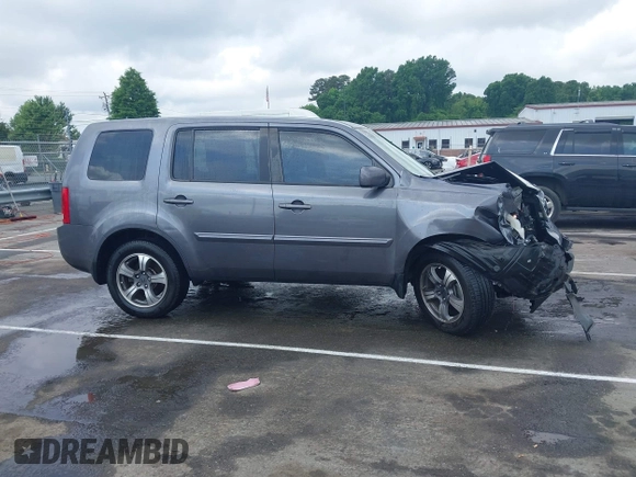 2015 Honda Pilot SE z VIN 5FNYF3H35FB034592, wystawiony jako IAAI lot #42133579 z przebiegiem 108 980 mil mil oraz . Historia ofert i sprzedaży dostępna na DreamBid. Obrazek 13.