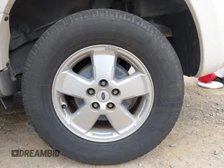 2009 Ford Escape XLS with VIN 1FMCU927X9KC79986, listed as a IAAI auction lot 41936917 with 208,816 mi miles and . Bid and sale history available at DreamBid. Image 12.