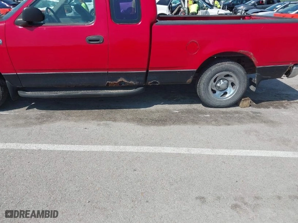 1998 Ford F-150 Standard with VIN 1FTZX1729WKB42151, listed as a IAAI auction lot 42074530 with 174,690 mi miles. Bid and sale history available at carsss.com. Image 6.