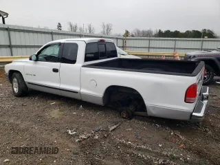 2001 Dodge Dakota Sport with VIN 1B7GL22N01S284441, listed as a Copart auction lot 83486504 with 114,613 mi miles and Salvage Title. Bid and sale history available at carsss.com. Image 2.