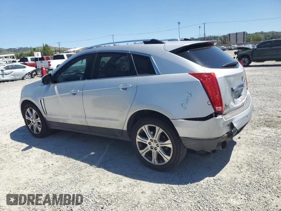 2015 Cadillac SRX Performance Collection with VIN 3GYFNFE31FS595552, listed as a Copart auction lot 55849145 with 149,601 mi miles and Salvage title. Bid and sale history available at DreamBid. Image 2.