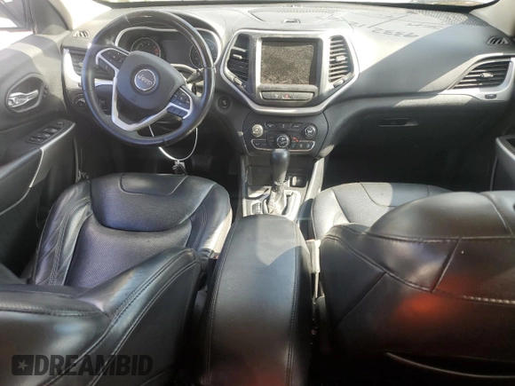 2016 Jeep Cherokee Overland with VIN 1C4PJLJB2GW302605, listed as a Copart auction lot 55143364 with 124,559 mi miles and Salvage title. Bid and sale history available at DreamBid. Image 8.