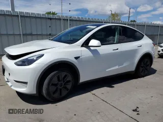 2024 Tesla Model Y Long Range with VIN 7SAYGAEE7RF205700, listed as a Copart auction lot 53814155 with 8,986 mi miles and Salvage Title. Bid and sale history available at DreamBid. Image 1.