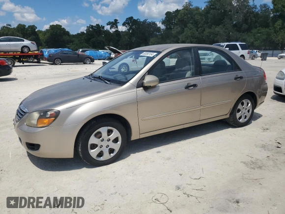 2009 Kia Spectra EX with VIN KNAFE221195600794, listed as a Copart auction lot 68090154 with 77,037 mi miles and Salvage Title. Bid and sale history available at carsss.com. Image 1.