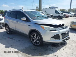 2014 Ford Escape Titanium с VIN 1FMCU0J9XEUB93591, выставлен на аукционе IAAI как лот 41721869 с пробегом 98 859 миль миль и . История ставок и продаж доступна на DreamBid. Изображение 1.