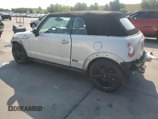 2012 MINI Convertible S z VIN WMWZP3C51CT296464, wystawiony jako Copart lot #64290005 z przebiegiem 107 580 mil mil oraz Szkoda całkowita • Salvage title. Historia ofert i sprzedaży dostępna na DreamBid. Obrazek 2.